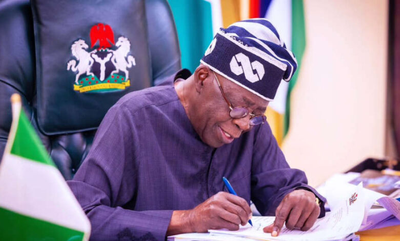 Bola Tinubu signing MSMEs Loan Disbursement